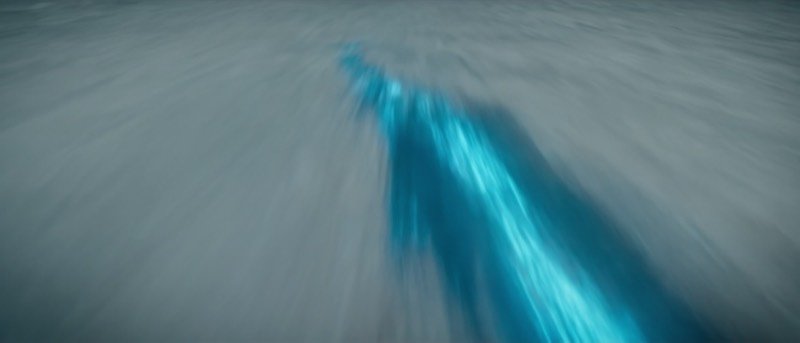 Streak of blue light racing over ice — AI short